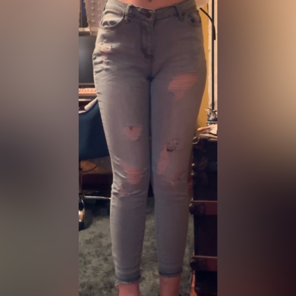 Light colored skinny jeans with rips, soft stretchy fabric